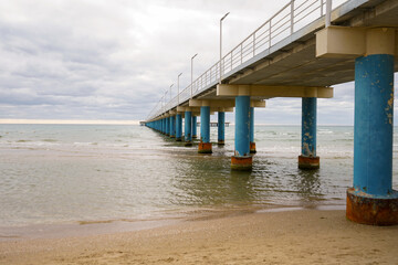 pier stretching far out to sea, seascape