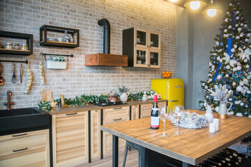 Chrismas interior of a kitchen, Christmas tree in the kitchen, decoration