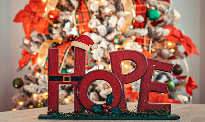 Hope with Christmas tree background and beautiful colors