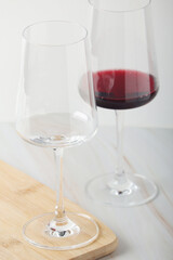 Red wine in a transparent white glass