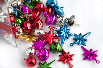 Miniature Christmas Ornaments on White Background