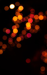 Bokeh de luces naranjas desenfocadas Navideñas.