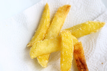 French fries in White bowl.
