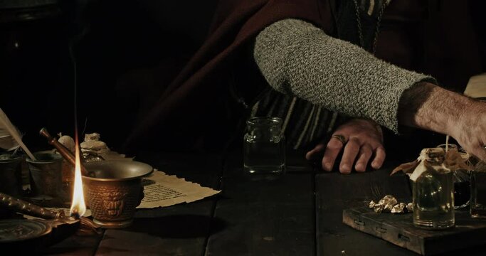 Alchemist working in his laboratory