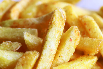 French fries in White bowl.