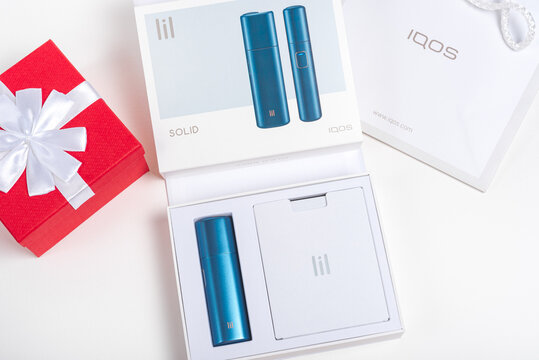 lil SOLID - new by IQOS - Electric Tobacco Heating System. Electronic Cigarette Technology, alternative smoking.