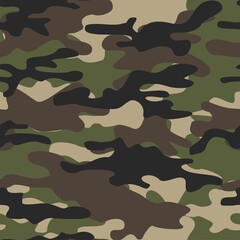 Green camouflage pattern military texture on textile. Repeat print. Fashionable background. Vector © keni