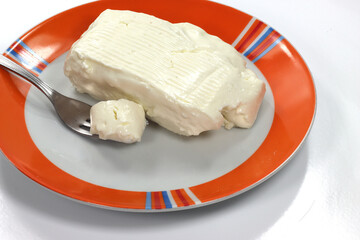 soft cheese stracchino spread on bread