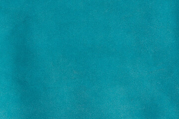 Bright cyan suede textured leather soft touch surface background