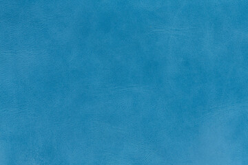 Cyan textured smooth leather surface background, small grain