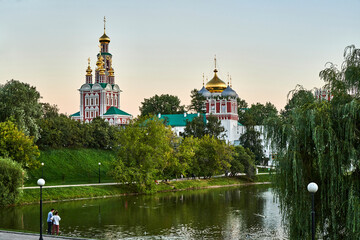 Fototapeta premium Russia. Moscow. Evening domes of the Novodevichy Convent over the Bolshoy Novodevichy Pond