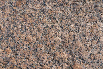 Natural brown granite stone surface, background photo