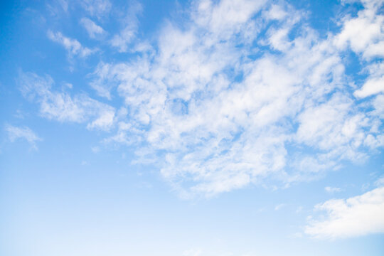Sky with white altocumulus clouds at daytime