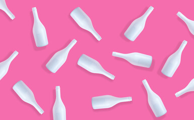 Creative celebration concept with champaign  bottles on pastel pink background. Flat lay design