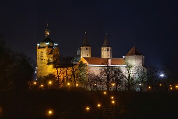 Fototapeta na wymiar historic buildings on the Tumskie hill in Plock, Poland at night
