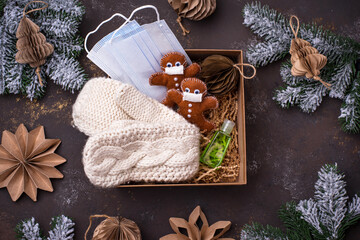 Christmas care package with mask and antiseptic