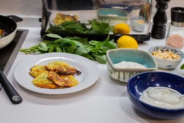 Grilled vegetables and healthy food dishes on a fancy wooden table. Mediterranean food dishes with asparagus, tofu, seitan and Halloumi cheese. Gluten free recipes for fitness persons. Food Background
