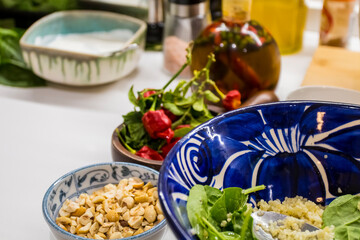 Grilled vegetables and healthy food dishes on a fancy wooden table. Mediterranean food dishes with asparagus, tofu, seitan and Halloumi cheese. Gluten free recipes for fitness persons. Food Background