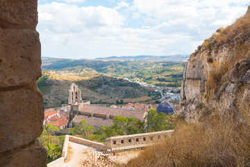 Morella castle ruins, ramparts and fortification. Morella is a beautiful historic walled city on a rock, Maestrat region, Castellon province, Valencian community, Spain. 