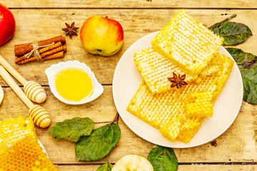 Autumn composition with fresh apples, pears, honeycombs and fragrant spices