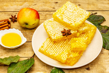 Autumn composition with fresh apples, pears, honeycombs and fragrant spices