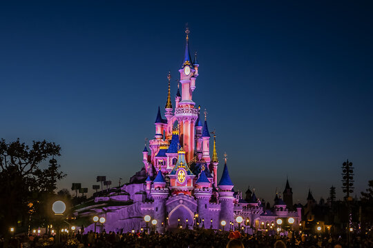 Night performances near Sleeping Beauty castle in Disneyland Paris. Disneyland Paris (Euro Disney Resort) - entertainment resort in Marne-la-Vallee. Marne-la-Vallee, France. March 30, 2019.