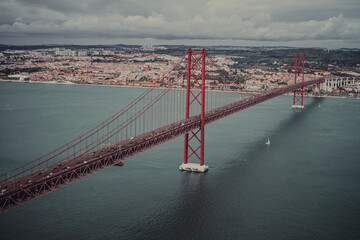 a great fast that stretches over the river. Bridge on April 25 in Portugal