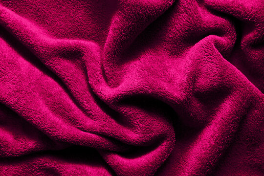 Soft Fluffy Fabric Background. Pink Blanket Texture. Wave Textile Pattern.