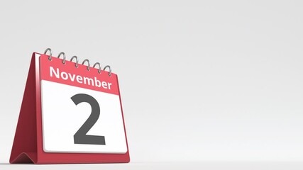 November 2 date on the flip desk calendar page, blank space for user text, 3d animation