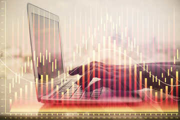 Double exposure of woman hands typing on computer and forex chart hologram drawing. Stock market invest concept.