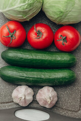 Fresh and Bright Vegetables Lie on the Kitchen Table