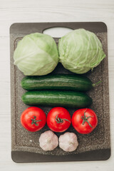 Fresh and Bright Vegetables Lie on the Kitchen Table