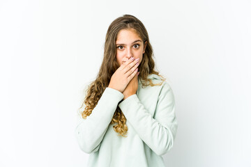 Young caucasian woman covering mouth with hands looking worried.