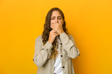 Young caucasian woman suffers pain in throat due a virus or infection.