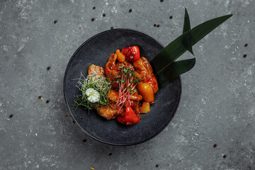 Cantonese Chicken Chinese Food. consists of chicken, bell peppers, pineapple, spicy-sweet sauce based on lychee puree