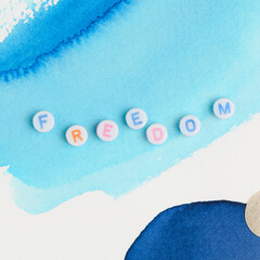 FREEDOM alphabet letter beads typography