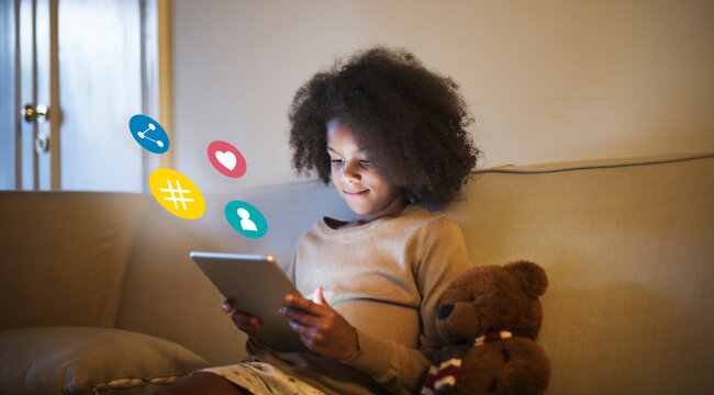 Young kid playing on her digital tablet - Powered by Adobe