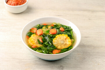 Sayur Bening Bayam is Daily Menu in Indonesian family, made from Spinach, Carrot, and Corn. Spiced with Garlic  and Salt. Served with Various Side Dish like Tofu or Fried Salted Fish and Sambal.