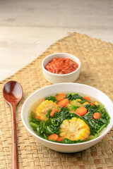 Sayur Bening Bayam is Daily Menu in Indonesian family, made from Spinach, Carrot, and Corn. Spiced with Garlic  and Salt. Served with Various Side Dish like Tofu or Fried Salted Fish and Sambal.