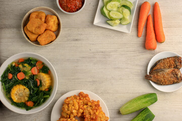 Sayur Bening Bayam is Daily Menu in Indonesian family, made from Spinach, Carrot, and Corn. Spiced with Garlic  and Salt. Served with Various Side Dish like Tofu or Fried Salted Fish and Sambal.
