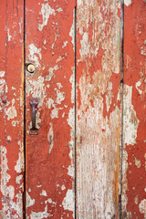 old textured red door