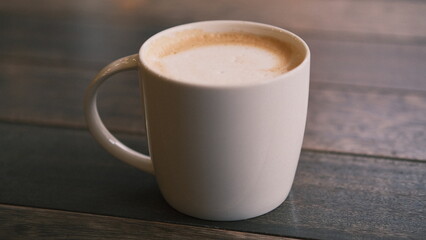 Obraz na płótnie Canvas perfect cappuccino in a simple white mug