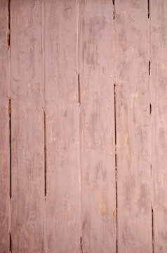 Brown wooden planks background. © Veronika Idiyat