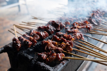 One of the typically Indonesian foods is satay or sate. This food is made from beef or mutton or chicken which is grilled over smoky coals then served with peanut sauce and soy sauce.