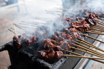 One of the typically Indonesian foods is satay or sate. This food is made from beef or mutton or chicken which is grilled over smoky coals then served with peanut sauce and soy sauce.