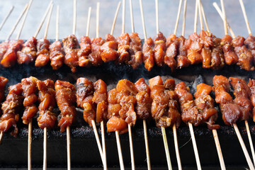 One of the typically Indonesian foods is satay or sate. This food is made from beef or mutton or chicken which is grilled over smoky coals then served with peanut sauce and soy sauce.