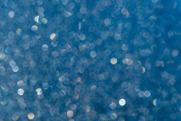 Blurred abstract glitter texture.