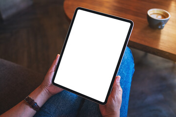 Top view mockup image of a business woman holding digital tablet with blank white desktop screen