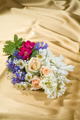 Bouquet Of Flowers On Fabric