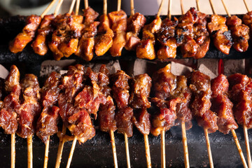 One of the typically Indonesian foods is satay or sate. This food is made from beef or mutton or chicken which is grilled over smoky coals then served with peanut sauce and soy sauce.